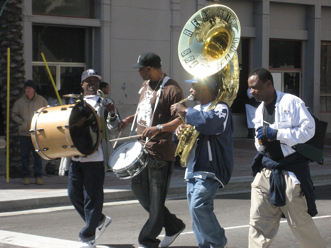 Rebirth Brass Band at small "Second Line" parade in the New Orleans Central Business District (Terrance "T-Bell" Andrews -Bass Drum, Derrick Tabb - snare drum, Phillip Frazier - tuba)