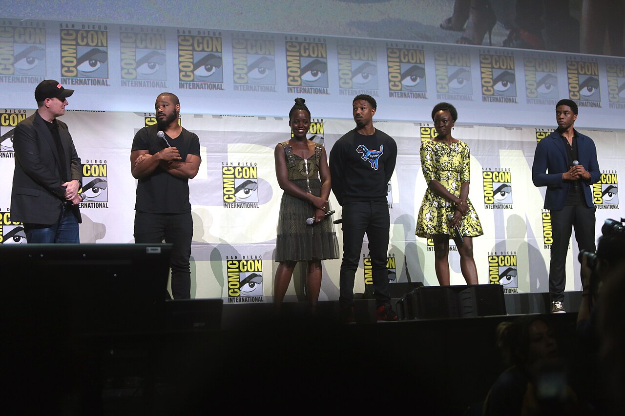 Kevin Feige, Ryan Coogler, Lupita Nyong'o, Michael B. Jordan, Danai Gurira and Chadwick Boseman speaking at the 2016 San Diego Comic Con International, for "Black Panther", at the San Diego Convention