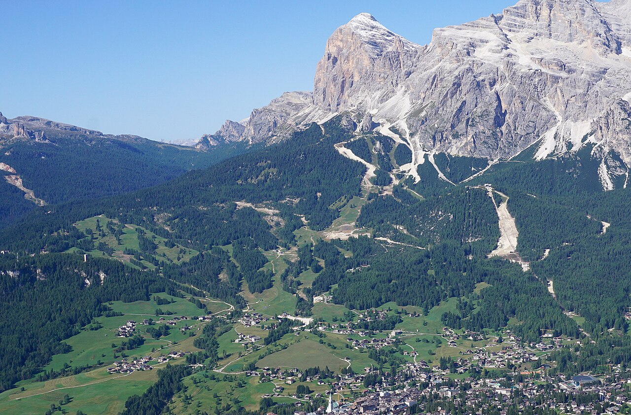 Cortina d'Ampezzo seen from Faloria. Olimpia delle Tofane ski race course, rocks Ra Pegna and Ra Bujela, lower hill Col Drusciè, Tofana di Rozes, Dolomiti, Stadio Olimpico del Ghiaccio (Olympic Ice St