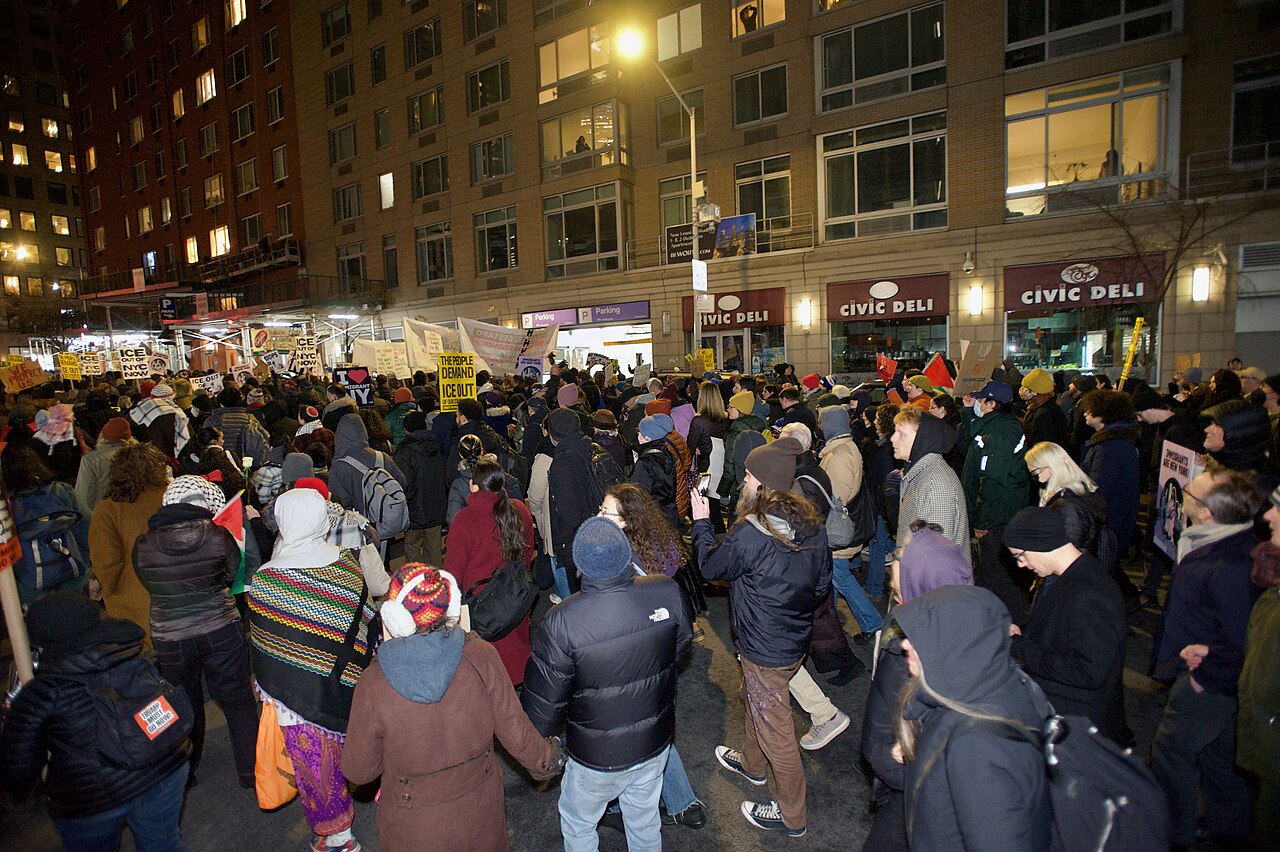 Protesters at Foley Square by the federal government building protesting the ICE killing of Renee Good hours earlier. People spoke at the monument, before walking around 26 Federal Plaza, and ending b