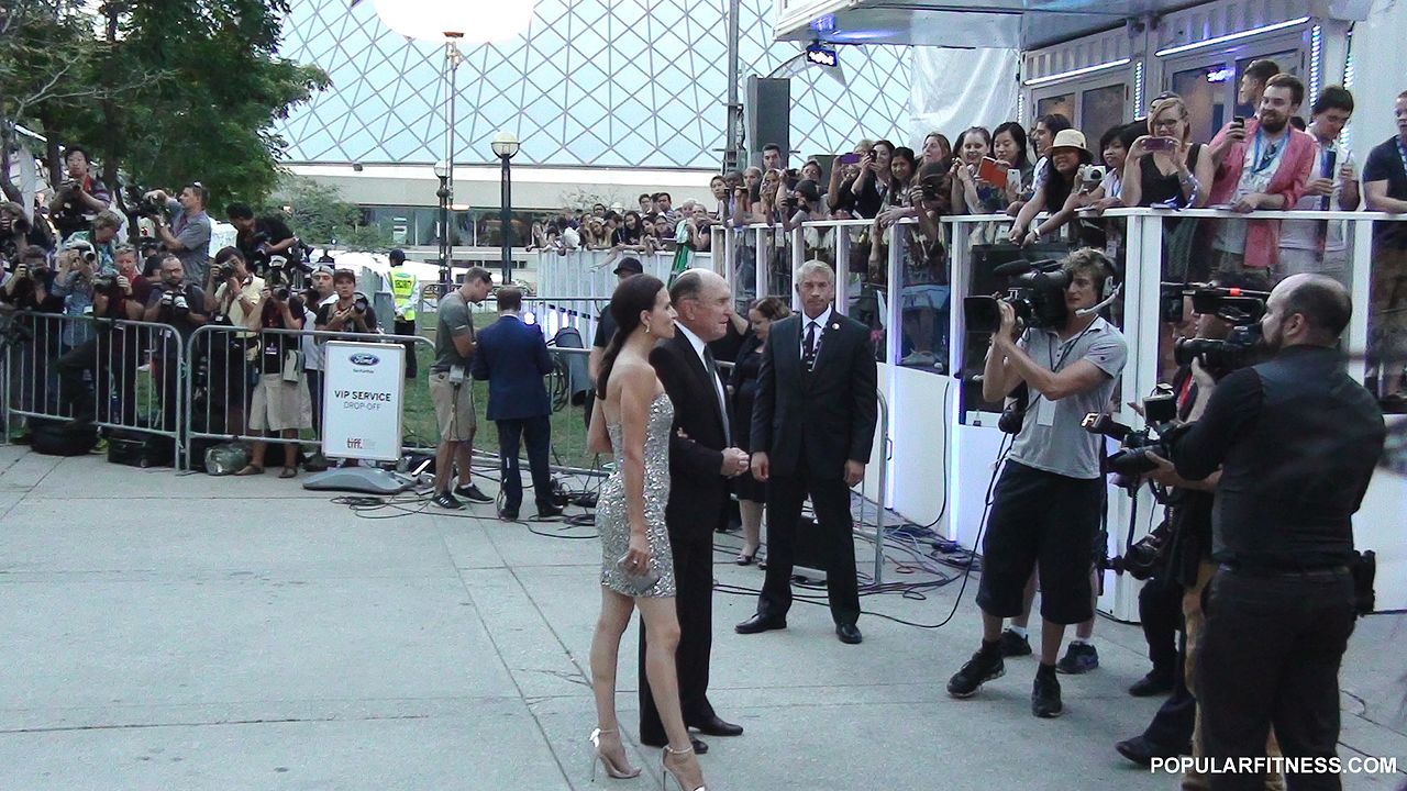 Husband and wife posing at Toronto International Festival. Watch HD video: www.mityzeusphotos.com/Luciana-Pedraza-TIFF.html