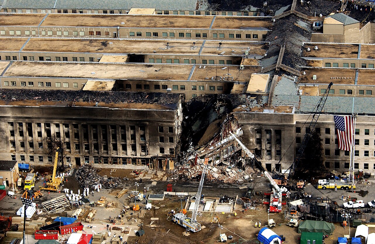 Aerial view of the Pentagon Building located in Arlington, Virginia showing emergency crews responding to the destruction caused when a hijacked commercial jetliner crashed into the southwest corner o