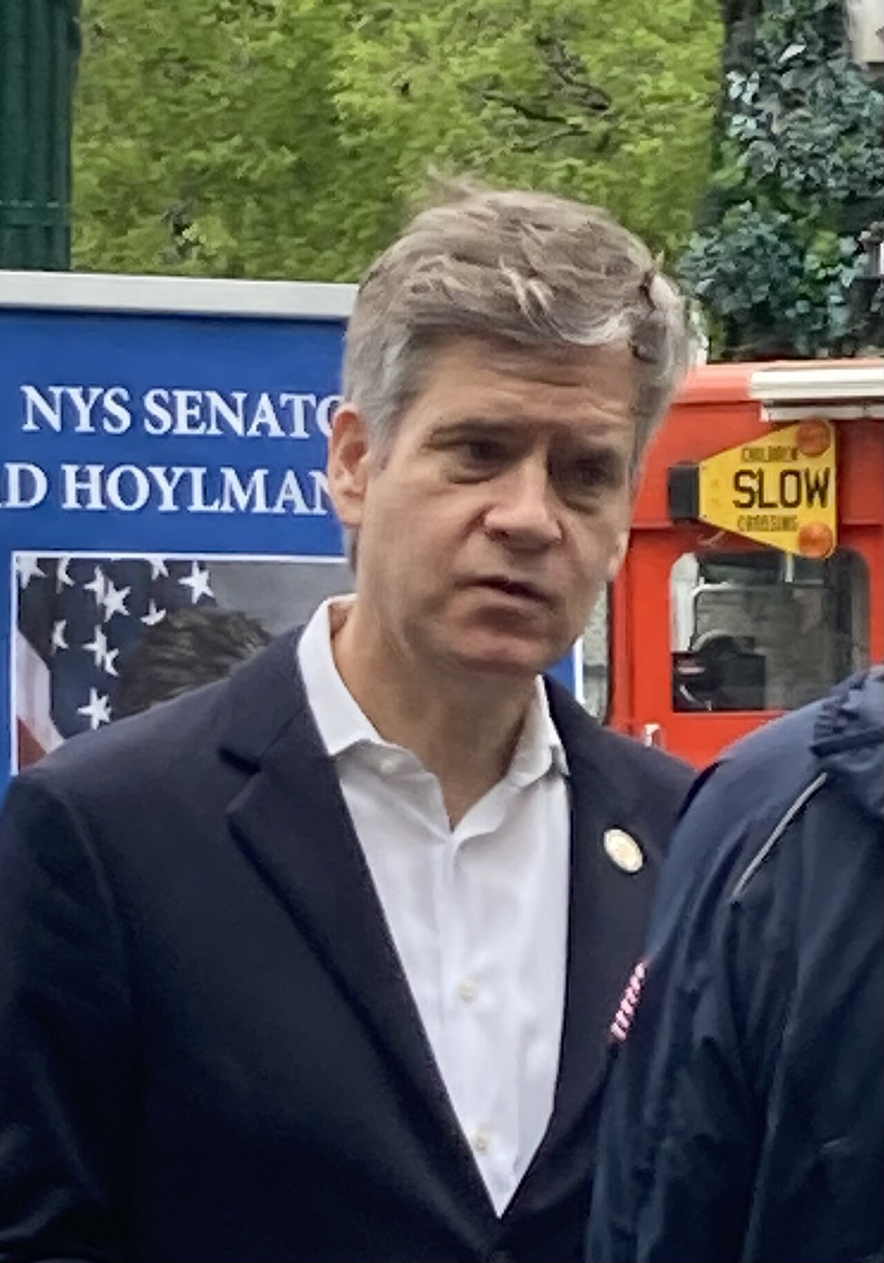 New York State Senator Brad Hoylman-Sigal holds a conversation with a member of his district on the corner of West 79th Street and Columbus Avenue in the Upper West Side neighborhood of Manhattan, New