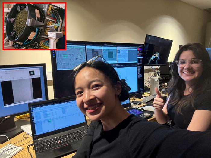 Ha Do (left) and Natalie Orrantia (right) at the observatory console at Las Campanas Observatory, smiling at the moment they discover the oldest known star