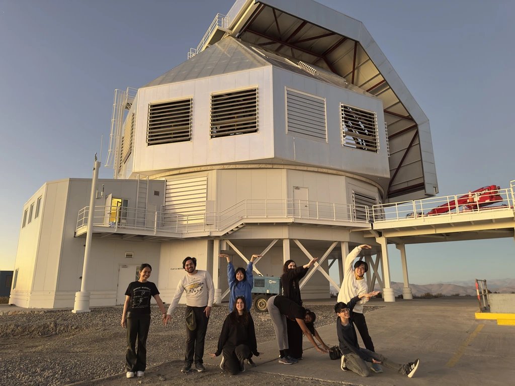 Natalie Orrantia, Ha Do, and classmates spell out MIKE in front of the Magellan Clay telescope at Las Campanas Observatory, Chile