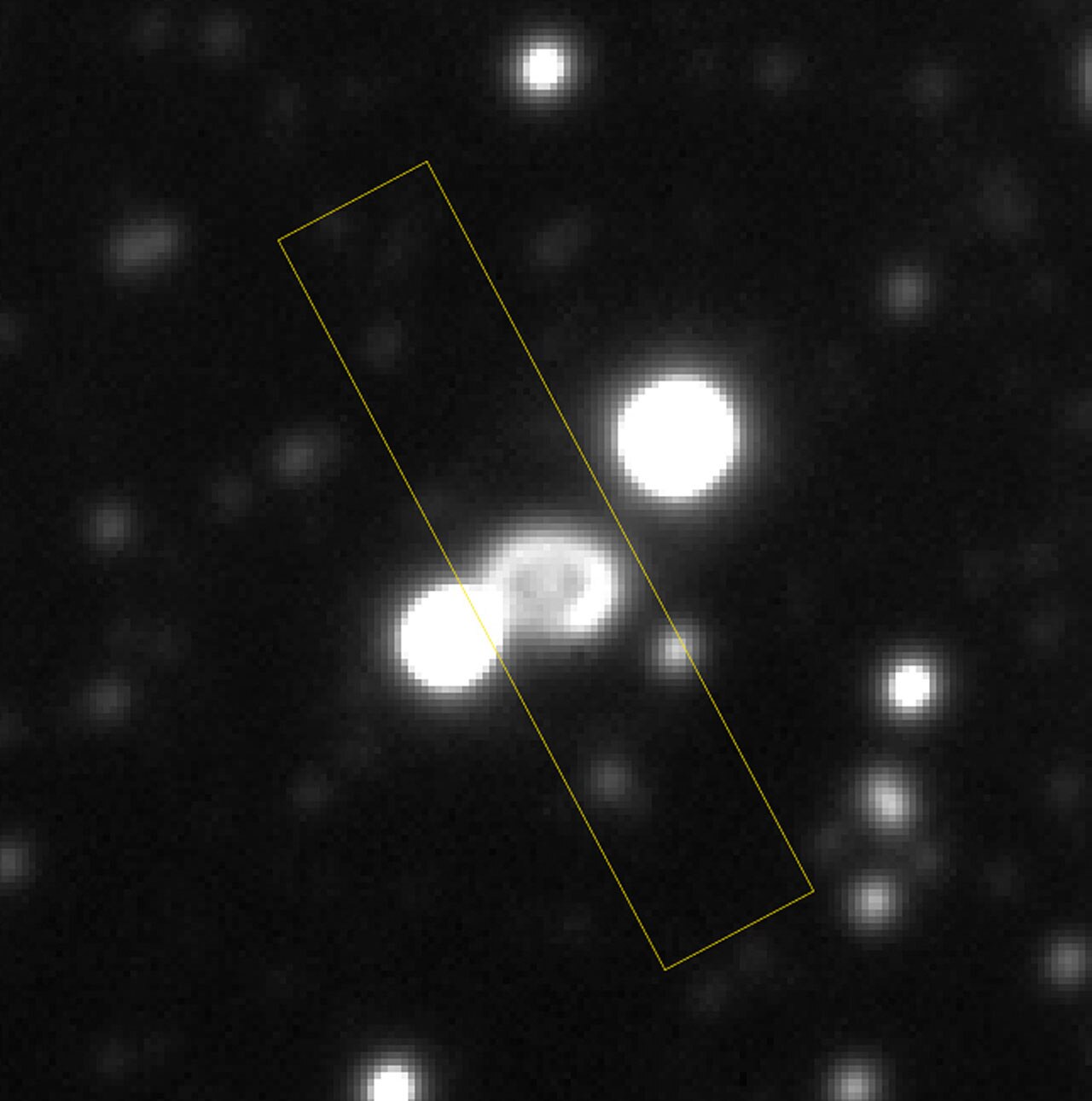 This is a direct image of SN1987A, flanked by two nearby stars. The distance between these two is 4.5 arcsec.  This reproduction is from a 2-min exposure through a R(ed) filter with the FORS1 multi-mo