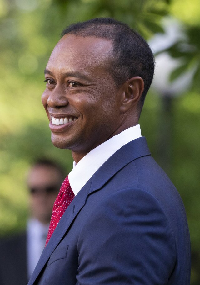 President Donald J. Trump presents the Presidential Medal of Freedom to Tiger Woods May 6, 2019, in the Rose Garden of the White House. (Official White House Photo by Joyce N. Boghosian)